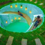 Build Water Slides into Round Underground Swimming Pool