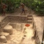 The two men happy Build Greatness Underground  Temple Swimming Pool  and d Underground Hut