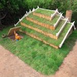 Building secret underground house with grass roof and clay