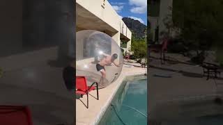 Austin Sprinz falls in pool while inside bubble!