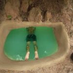 Building log cabin house on underground Swimming Pool